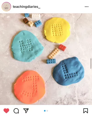 instagram screenshot of a post with some colourful clay and LEGOs